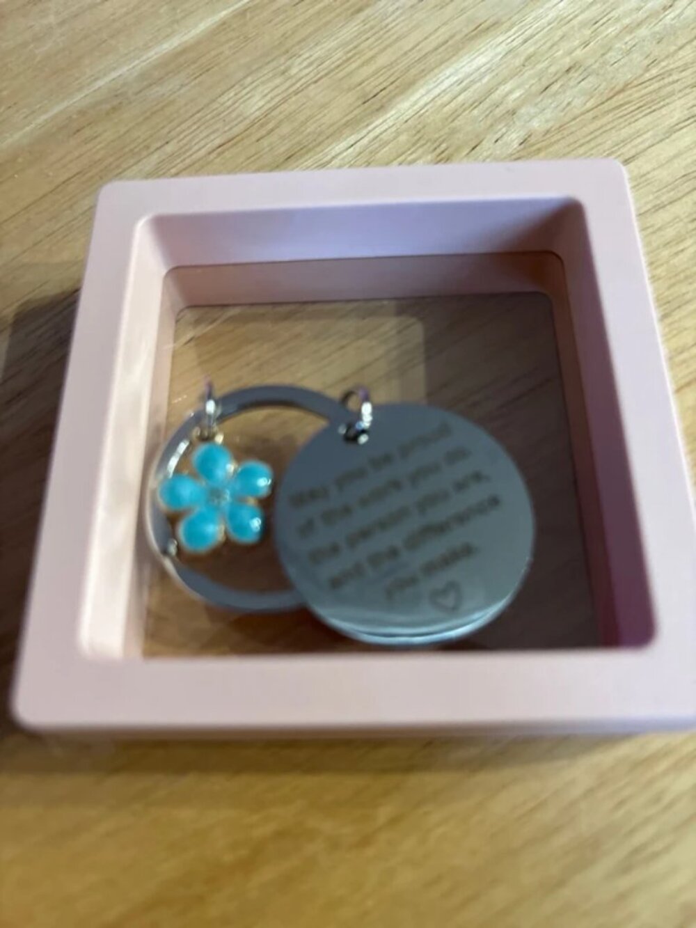 NEW may you be proud.keychain with flower